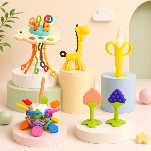 Baby sensory and teething gift hamper with the toys laid out together
