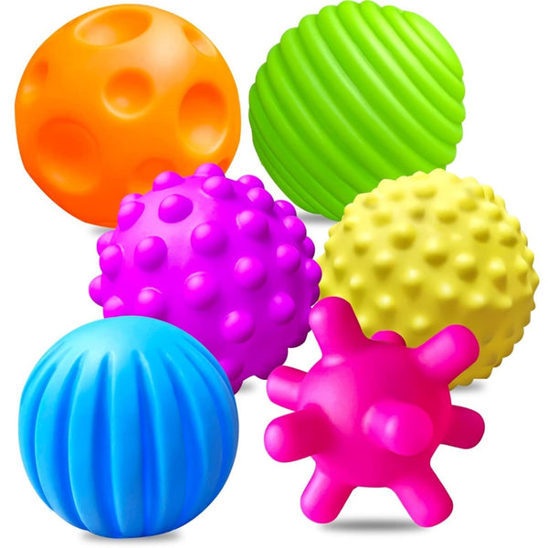 Six soft silicone sensory balls with different raised textures in darker colours