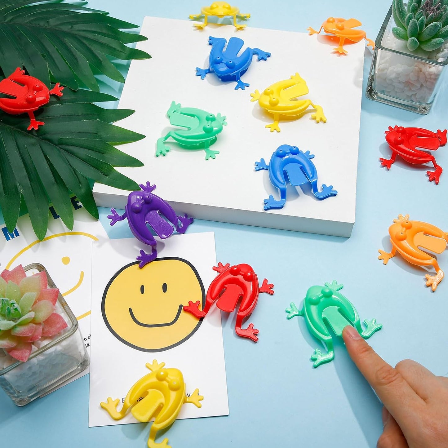 PLASTIC JUMPING FROG FINGER PRESS TOY